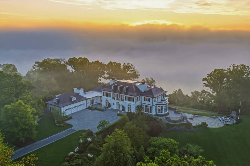 Morning fog over the river-bluff lawn
