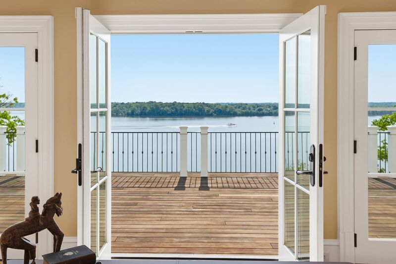 Private river-view balcony off the primary suite